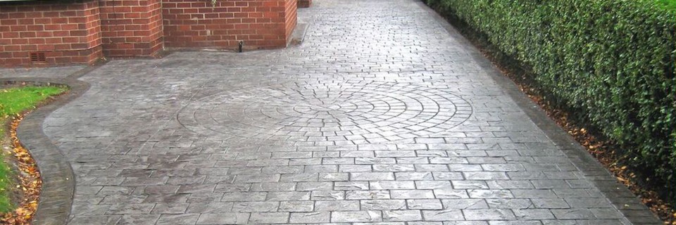 We offer Bespoke Pattern Imprinted Concrete to make your driveway look spectacular
