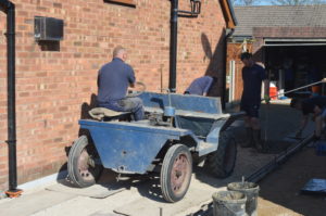 l.moving the concrete into situ